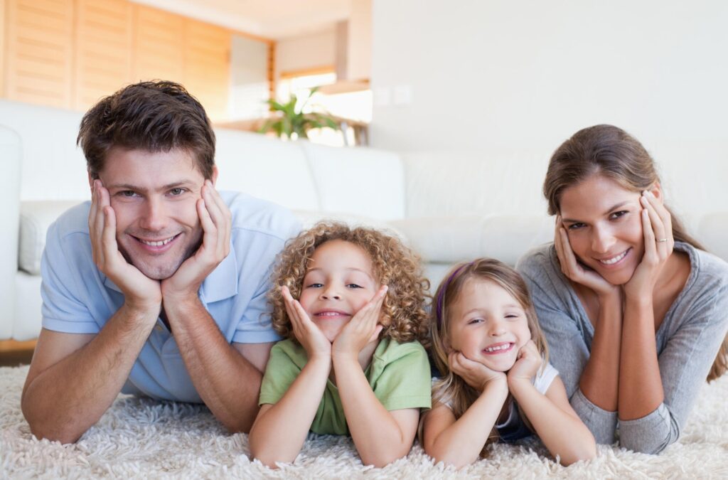 Family on Carpet | Bram Flooring