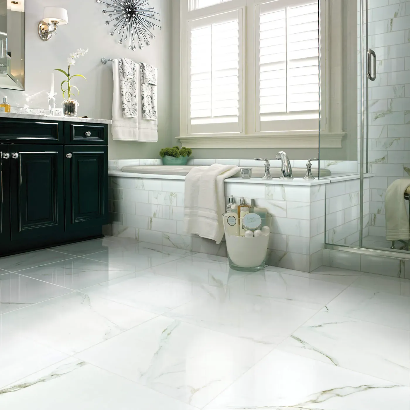 CASINO-POLISHED-CS37V-CASINO4X12-CS35V-CALACATTA-ORO-00121-V Shaw Floors Calacatta Oro polished white marble-look tile in a luxurious bathroom | Bram Flooring